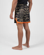 Kingz Always Hunting Shorts Green Camo - Full Body Left-Back Side Profile Male Athlete Tiger Camo Pattern Orange Bold Side Accent Panel Inner Compression Shorts Orange Hem Visible Competition Cut Men's Grappling Shorts No-Gi BJJ