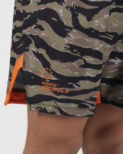 Kingz Always Hunting Shorts Green Camo - Close Up Side Detail KINGZ ORIGINALS Orange Text Badge Crown Logo Right Side Tiger Camo Pattern Orange Side Panel Inner Compression Shorts Orange Fabric Men's Grappling Shorts No-Gi BJJ