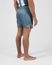 Kingz Vintage Futebol Shorts Light Blue - Full Body Back View Narrow Stance Male Athlete Steel Blue Clean Back Design Soccer Inspired Competition Cut Men's Grappling Shorts No-Gi BJJ