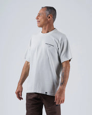 Kingz HQ V2 Tee - Front Three Quarter Angle - Kingz Kimonos HQ Chest Print Garment Washed Cotton - Light Gray BJJ Tee