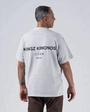 Kingz HQ V2 Tee - Back Three Quarter Angle - Kingz Kimonos Japanese Text San Diego Print Side View - Light Gray BJJ Tee