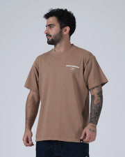 Kingz HQ V2 Tee - Front Three Quarter View - Kingz Kimonos HQ Location Chest Print - Mocha Tan Garment Wash BJJ Tee