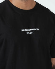 Kingz Solo Tee - Chest Text Macro Closeup - KINGZ KIMONOS EST 2011 White Minimal Print - Black BJJ Tee