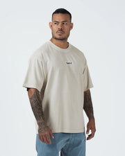 Kingz Box Tee - Upper Body Front Cropped View - KINGZ Box Label Chest Detail Natural Tan BJJ Cotton Tee