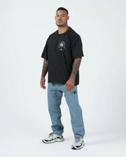 Kingz Gentle Art Tee - Full Body Lifestyle Shot - Oversized Fit Worn With Jeans - Black BJJ Tee