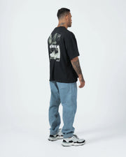 Kingz Gentle Art Tee - Back Three Quarter Lifestyle - Pursue Gentle Art Back Print Visible - Black BJJ
