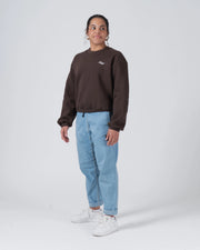Kingz Script Women's Crewneck - Full Body Lifestyle Shot - Cropped Fit with Denim - Earthy Brown - Women's BJJ Crewneck