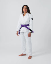 Kingz Kore V2 Women's BJJ Gi White - 3/4 Angled Front View Female Athlete Purple Belt Crown Logo Women's Slim Cut