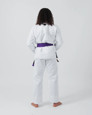 Kingz Kore V2 Women's BJJ Gi White - Upper Body Back View Crown Logo Collar Detail Female Athlete Purple Belt