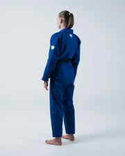 Kingz Kore V2 Women's BJJ Gi Blue - Full Body 3/4 Back View Female Athlete Black Belt Dual Crown Logo Women's Fitted Silhouette