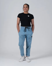 Kingz Kore Women's Baby Tee - Lifestyle Shot - Hands in Pockets Pose - Black Women's BJJ Tee [color:Black]