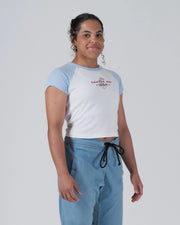 Kingz Gentle Art Club Women's Baby Tee - Lifestyle Shot - Waist Up Chest Graphic Smile - White Women's BJJ Tee