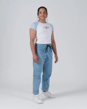 Kingz Gentle Art Club Women's Baby Tee - Lifestyle Shot - Full Body Standing Pose - White Women's BJJ Tee