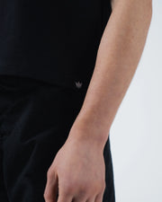 Kingz Women's Heavyweight Tee - Detail Shot - Crown Hem Tab Side Drape - Black Women's BJJ Tee