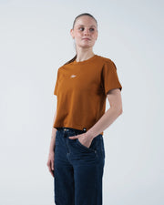 Kingz Women's Heavyweight Tee - Lifestyle Shot - Hand in Pocket Casual Pose - Vintage Orange Women's BJJ Tee