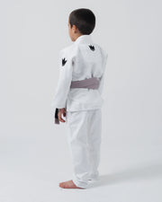 Kingz Kore V2 Youth BJJ Gi White - Full Body 3/4 Back View Young Athlete Gray Belt Dual Crown Logo Youth Kids Gi