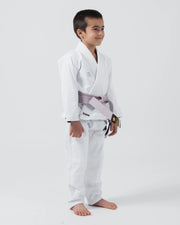 Kingz Kore V2 Youth BJJ Gi White - Full Body Angled Front View Young Child Athlete Gray Belt KINGZ Logo Youth Kids Gi