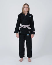 Kingz Nano 3.0 Youth BJJ Gi Black - Upper Body Front View Girl Athlete Gray Belt Crown Logo NANO Text KINGZ Badge Youth Kids