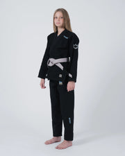 Kingz Nano 3.0 Youth BJJ Gi Black - Upper Body Straight Front View Girl Athlete Gray Belt Crown Logo NANO Text Youth Kids