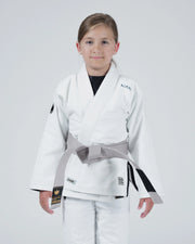 Kingz Nano 3.0 Youth BJJ Gi White - Upper Body Front View Girl Athlete Gray Belt NANO Text Crown Logo 380gsm Youth Kids Size