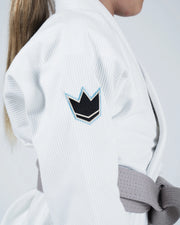 Kingz Nano 3.0 Youth BJJ Gi White - Upper Body Front View Girl Athlete Gray Belt NANO Text Crown Logo 380gsm Youth Kids Size