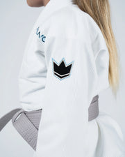 Kingz Nano 3.0 Youth BJJ Gi White - Upper Body Front View Girl Athlete Gray Belt NANO Text Crown Logo 380gsm Youth Kids Size