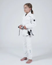 Kingz Nano 3.0 Youth BJJ Gi White - Upper Body Front View Girl Athlete Gray Belt NANO Text Crown Logo 380gsm Youth Kids Size