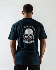 Kingz Immersion Tee Navy - Back View Male Athlete White Skull Graphic Jiu Jitsu Lifestyle Text Immerse Yourself Kingz Kimonos Logo Casual Fit Streetwear [color:Navy]
