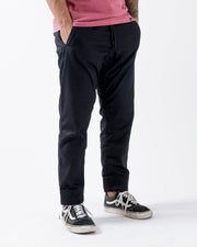 Kingz Casual Rip Stop Gi Pant Black - Full Body Front View Male Athlete Black Drawstring Waist Ribbed Cuffs Relaxed Fit Durable Fabric BJJ Gi Training Apparel [color:Black]