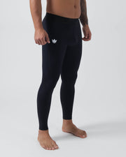Kingz Kore Grappling Spats Black - Full Body Right Side Profile Shirtless Tattooed Male Athlete All-Black Small White Crown Logo Left Thigh High-Waist Full-Length Compression Fit Men's No-Gi BJJ Spats Kore Collection