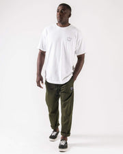 Kingz Casual Rip Stop Gi Pants - Military Green - Full Body Front View Male Athlete Rolled Cuffs Drawstring Waist Kingz Logo Patch Right Thigh Relaxed Fit BJJ Gi Training Pants [color:Military Green]